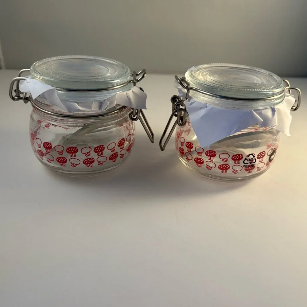 Lot Of 2 New IKEA KORKEN Jars Red Mushroom Print Glass Storage Seals Tight 2.75”